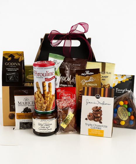 Gift basket filled with chocolate goodies of various types.