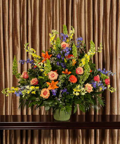 Sympathy basket of colorful flowers. 