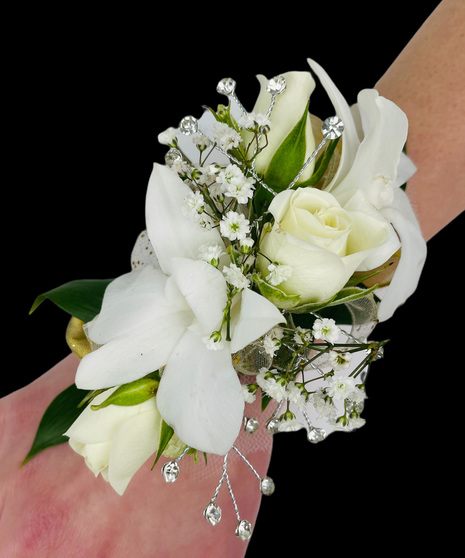 White spray Rose Corsage Hot pink ribbon in Huntsville, AL